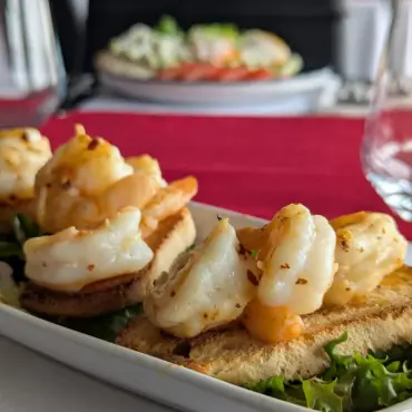 Garlic king prawns on toasted crostini