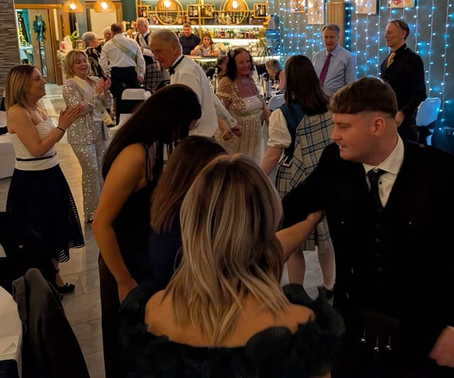 Guests celebrating on the dance floor