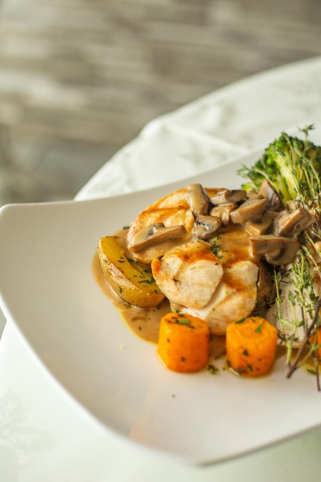 Pan-seared chicken with mushrooms and roasted carrots