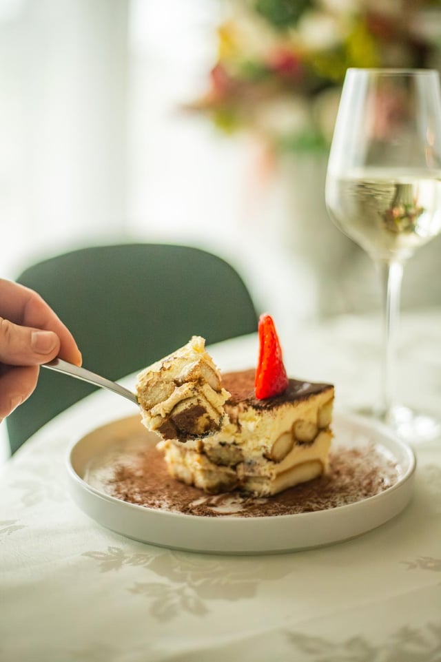 Tiramisu, fork lifting a bite