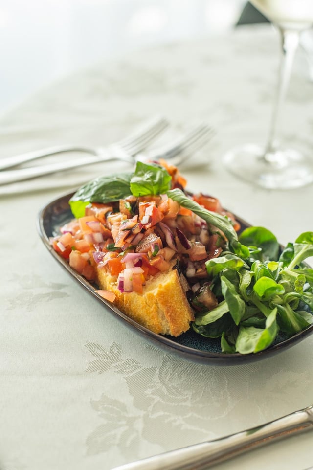 Bruschetta with tomato and red onion